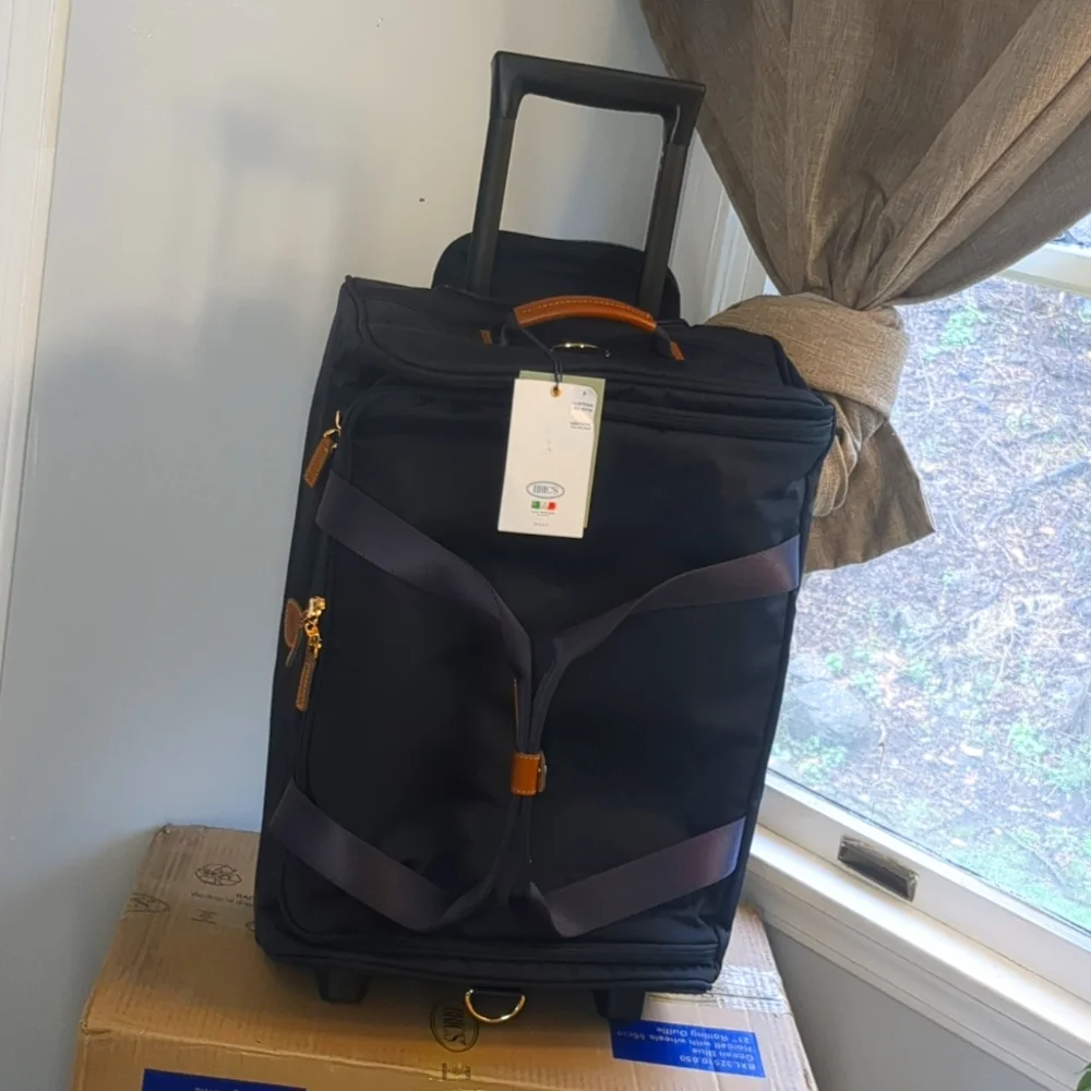 Rolling Duffel Bag - 21 Inch Carry On Travel Bag for Men and Women - Lux…